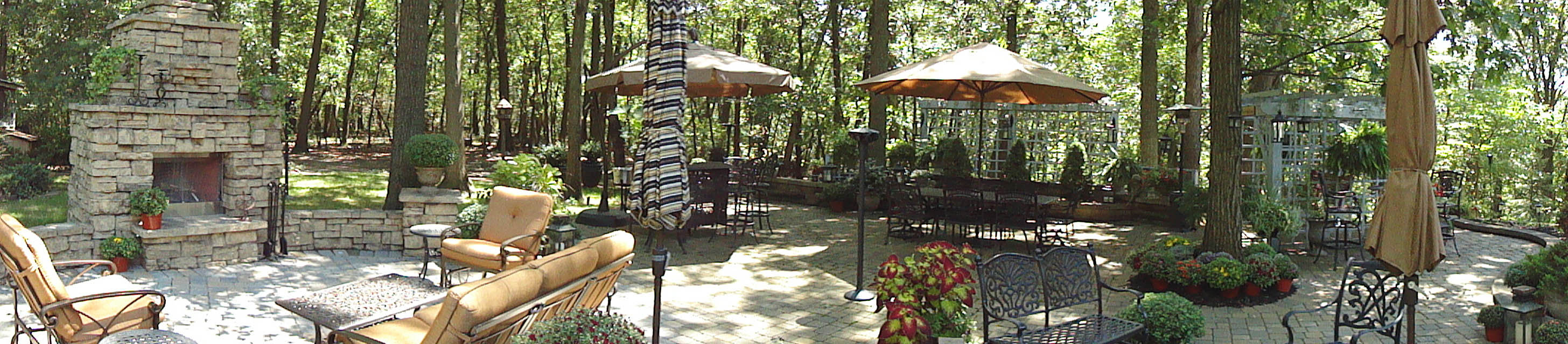 Backyard paradise - stone fireplace - grill, paving stones, wall and beautiful setting