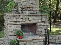 beautiful fireplace in backyard
